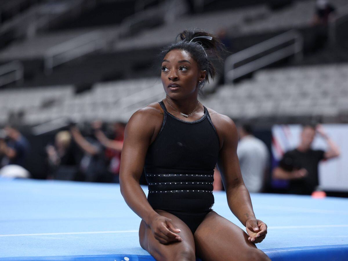 Simone Biles opens up about juggling Olympic tension and fan expectations amid the Paris Olympic finals.